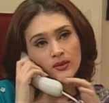 Tina Sharma (Eva Grover)